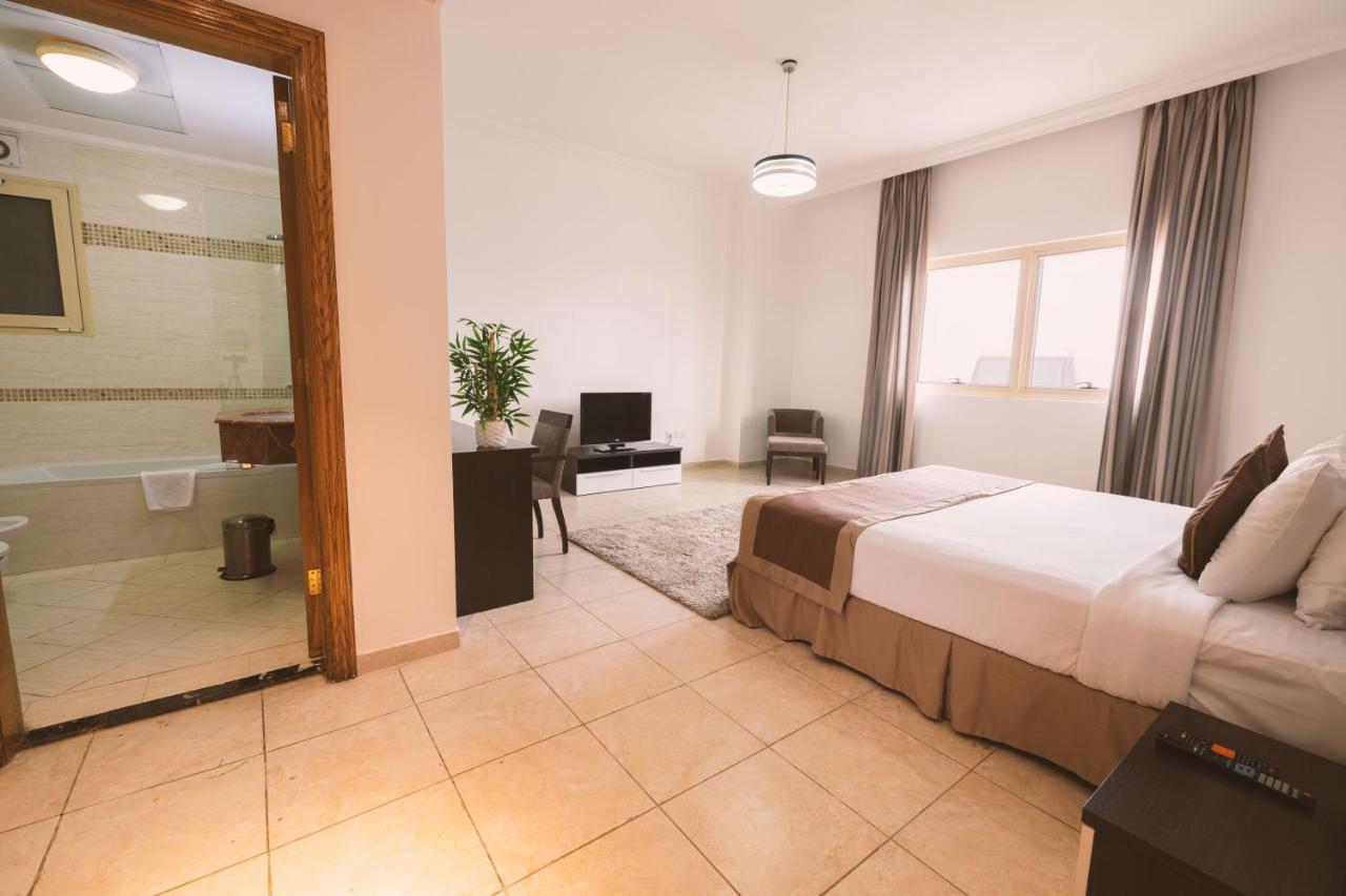 Magnum Hotel & Suites West Bay Доха Екстер'єр фото