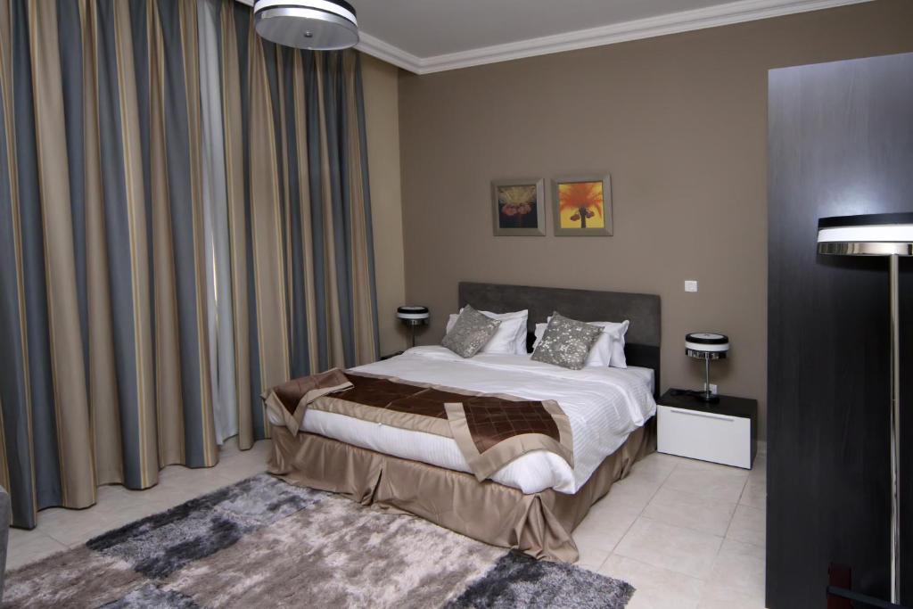 Magnum Hotel & Suites West Bay Доха Номер фото